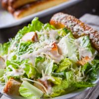 Caesar Salad · Fresh romaine greens tossed with grated Parmesan cheese, croutons and flavorful Caesar dress...