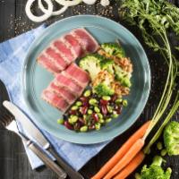 Seared Ahi Tuna · Light, lean and packed with protein. 7 pieces seared ahi tuna on 3 bean and broccoli quinoa ...