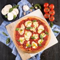 Margherita Classico Pizza · Fresh mozzarella, basil and tomatoes.