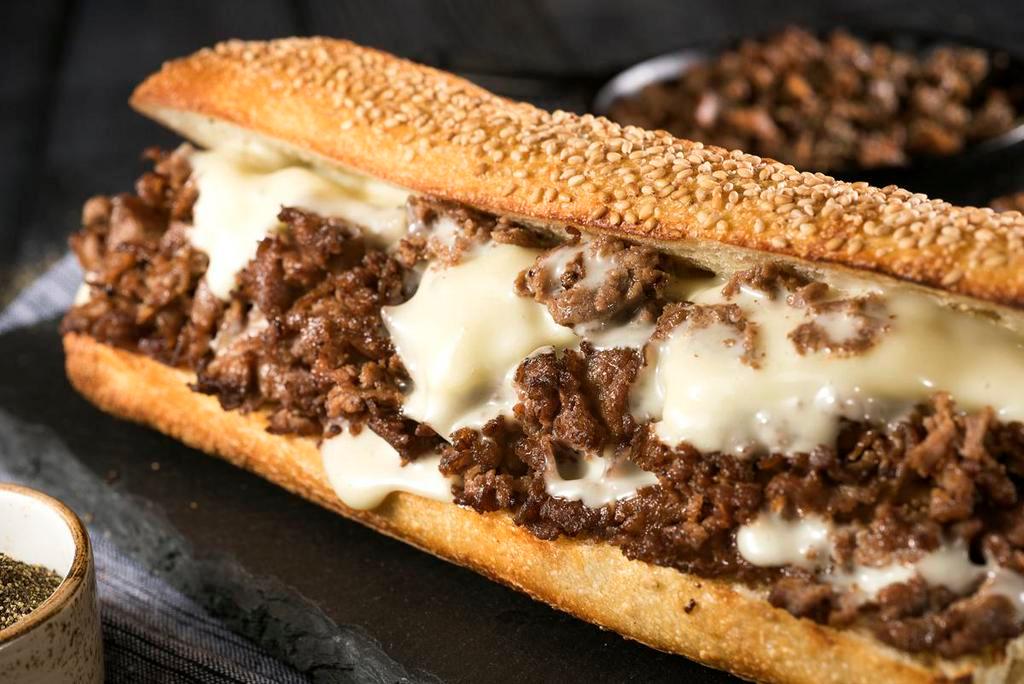 Cheese Steak · American cheese melted over steak.