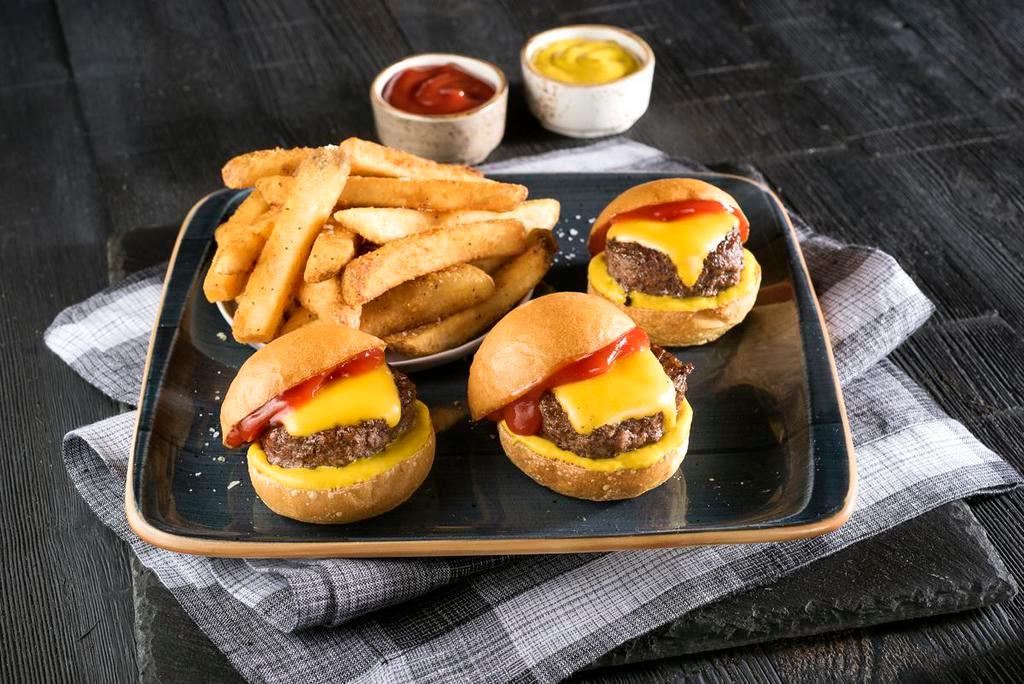Cheeseburgers Sliders · Bite sized burgers on mini brioche buns with ketchup and mustard. Served with french fries.