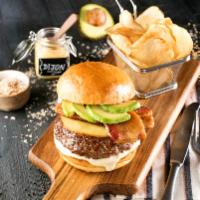 Bacon Prime Burger · Topped with avocado, thick cut bacon, horseradish Dijon and smoked Gouda cheese. Served with...