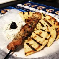 Chicken Souvlaki Stick · Chicken grilled on a skewer. Served with pita bread & choice of sauce.