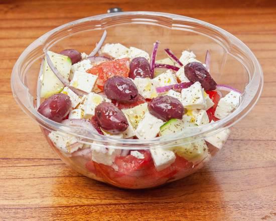 Xoriatiki Salad · Vine tomato, cucumber, red onion, feta cheese, kalamata olives, topped with extra virgin oil and red wine vinegar