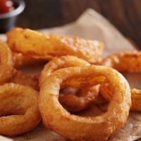 Onion Rings · Homemade fried, thick battered white onion rings served with your choice of dipping sauce.