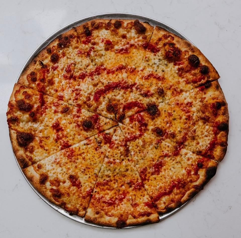 Cheesin' Pizza 18' · Mozzarella, Parmigiano-Reggiano, Tomato. Vegetarian.