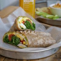 Breakfast Wrap · Organic hard-boiled egg, avocado, tomato, feta and spinach wrapped in a spinach tortilla and...