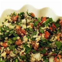 Tabouleh · Cracked wheat, parsley, onion, tomato, lemon juice and olive oil. Gluten free and vegan.