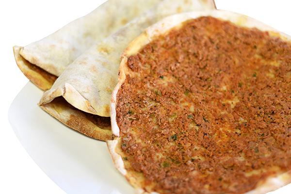 Lahmajoun Armenian Pizza · Homemade flat bread with a layer of seasoned ground beef.