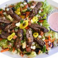 Lula Kebab Salad · Romaine, ground beef kebabs, feta cheese, California olives, onion, tomato, cucumber and car...