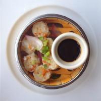 Shumai · Mini dumplings with shrimp and garlic, steamed or fried, served with sweet soy sauce. (6pcs)