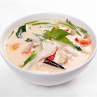 Tom Kha Soup · Coconut infused broth with galanga root, mushroom, tomato, onion, cilantro and citrus leaf, ...
