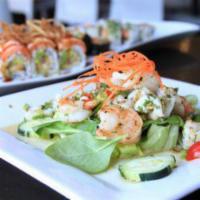 Seafood Salad with Lemongrass · Mixed-greens, charbroiled shrimp, scallops and squid with sliced lemongrass, onion, tomato, ...