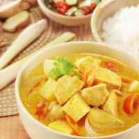 Mild Curry · Thai yellow curry with sweet potato and bell pepper in coconut milk. Served with jasmine rice.