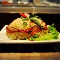 Fried Rice · Your choice of chicken, tofu or vegetables, stir-fried with rice, egg, onions and carrot.