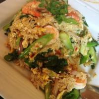 Rock Fried Rice · Your choice of protein, tofu or vegetables, stir-fried with rice, egg, Chinese broccoli, tom...