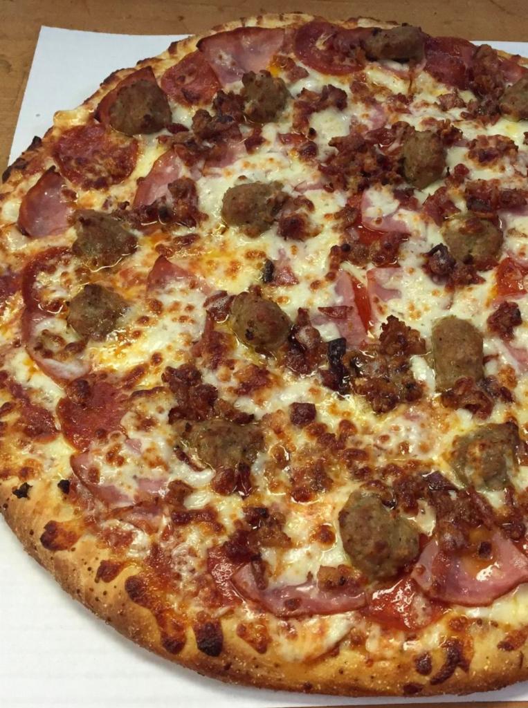 All Meat Pizza · Pepperoni, ham, Italian sausage, bacon, our original sauce and signature three cheeses.