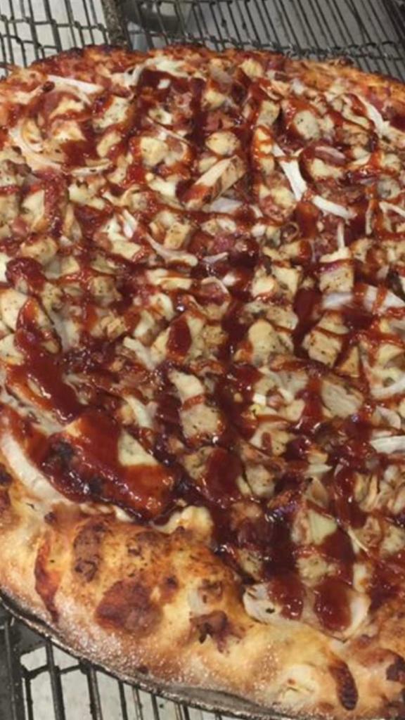 BBQ Chicken Pizza · Grilled chicken, bacon, onions, our signature 3 cheese and original sauce, topped with tangy BBQ sauce.
