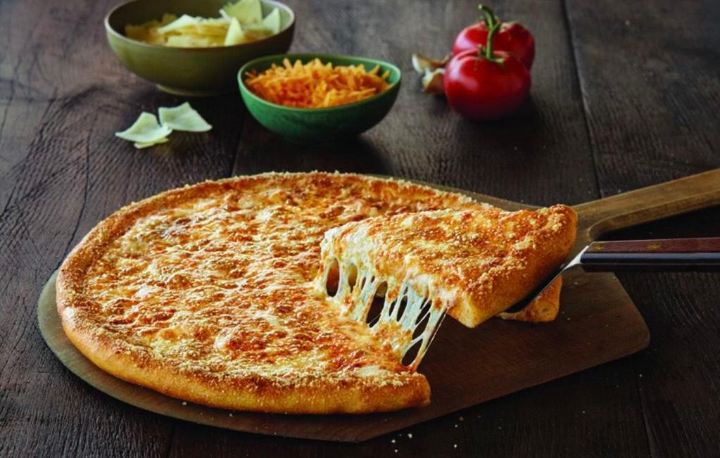The Big Cheese Pizza · Our original sauce and signature 3 cheeses, plus cheddar and shaved Parmesan, topped with garlic and our Parmesan cheese crust topper.