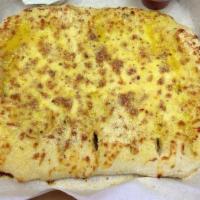 Cheezybread · Fresh-baked, bread strips with our signature 3 cheeses and garlic sauce, served with a side ...