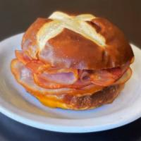Pretzel Bun Sandwich - Club · Pretzel Bun Sandwich - Club made with Turkey, Hem and Bacon