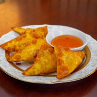 Crab Rangoon · Five pieces. Fried wontons loaded with crab meat and cream cheese.