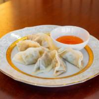 Vegetable Gyoza · Six pieces. Steamed or deep-fried. Meat and vegetable dumpling.