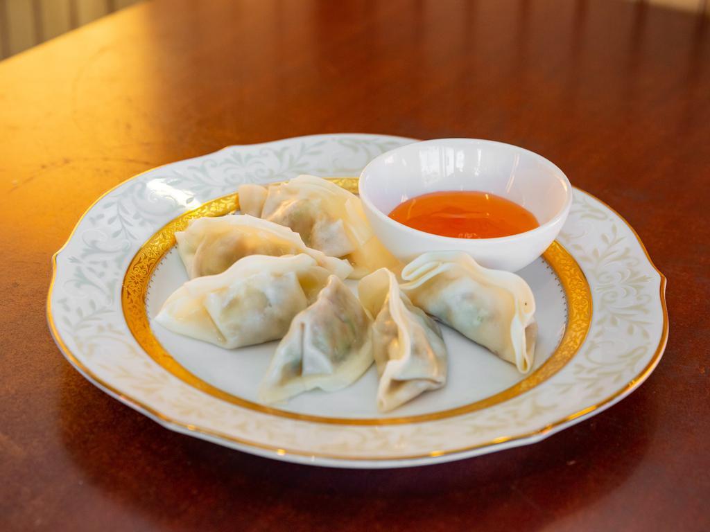 Vegetable Gyoza · Six pieces. Steamed or deep-fried. Meat and vegetable dumpling.