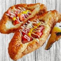 Sonoran Dog (100%BEEF HOT DOG) · Bacon it's like HIGH-FIVE to your mouth! Beef dog Wrapped in bacon, whole pinto beans, grill...