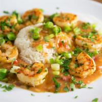TEE KITTY'S SHRIMP ETOUFFEE · Trinity seasoning and 1lb of Gulf shrimp smothered in a blonde roux with Creole seasonings a...