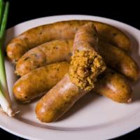 CRAWFISH & PORK BOUDIN (1lb) · A yummy combination of crawfish, pork, rice and Creole seasonings in a sausage casing. Great...
