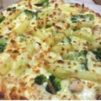 Chicken and Broccoli Alfredo Pizza · Grilled chicken, broccoli and penne pasta on our pizza crust with our homemade Alfredo sauce...