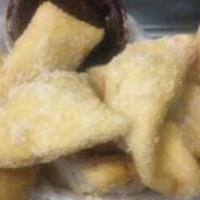 MC Doughboy Twists · Our homemade doughboy twists sprinkled with sugar and a side.