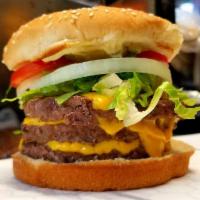 Triple Cheese Burger · 3 burger patties, 3 slices cheese, mayonnaise, mustard, tomato ketchup, onions, lettuce, and...