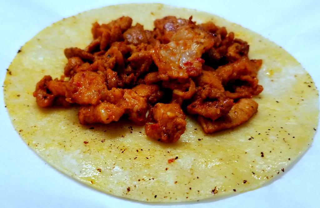 Tacos Modifier · 1 large tortilla, choice of meat, onions, salsa, and cilantro.