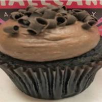 Choco-Holic Cupcake · Chocolate cake with chocolate buttercream topped with chocolate shavings.