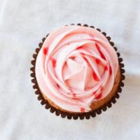 Strawberry Cupcake · Strawberry cake with our signature strawberry buttercream and fresh sliced strawberry.