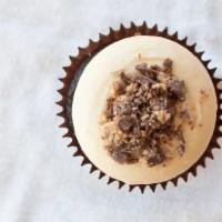 Peanut Butter Cupcake · Chocolate cake with peanut buttercream cheese frosting, topped with crumbled reese's peanut ...