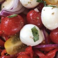 Mozzarella Tomato and Roasted Peppers Salad · Mozzarella bocconcini, assorted roasted peppers, grape tomatoes, olive oil, basil and Kalama...