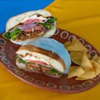 Tortas · Torta bread (choice of meat) beans, onion, tomatoes, lettuce, queso fresco and jalapeno.