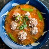 Meatballs soup (albondigas) · Meatballs soup, rice, onion, cilantro,lemon, chile and tortillas