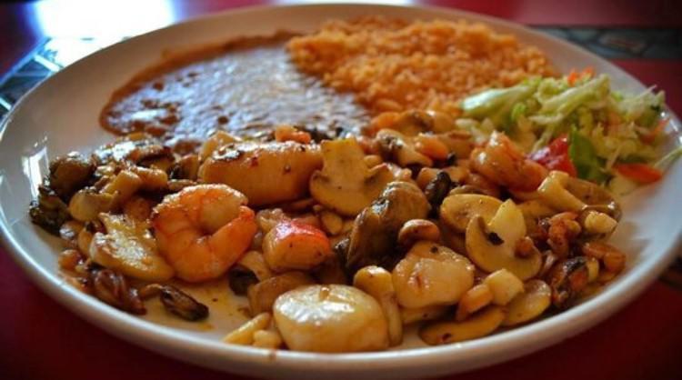 Camarones Rancheros · Grill Shrimp served with rice, beans, salad and corn tortillas.