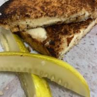 Grilled-Cheese Combo · Specialty grilled-cheese with house-made chips and drink.  Add Extra Bacon. Cheese includes ...