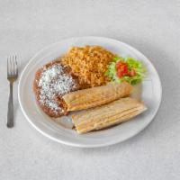 2 Beef Tamales · Served with rice and beans.