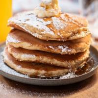 Flapjack Pancakes · 4 griddle buttermilk pancakes with syrup, butter and powdered sugar with your choice of pres...