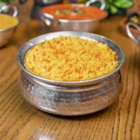 Yellow Rice · Basmati rice with saffron spices.