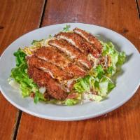 Chicken Bacon Ranch Dinner Salad · Romaine lettuce, tomato, bacon, shredded cheese, and our hand breaded chicken breast. Served...
