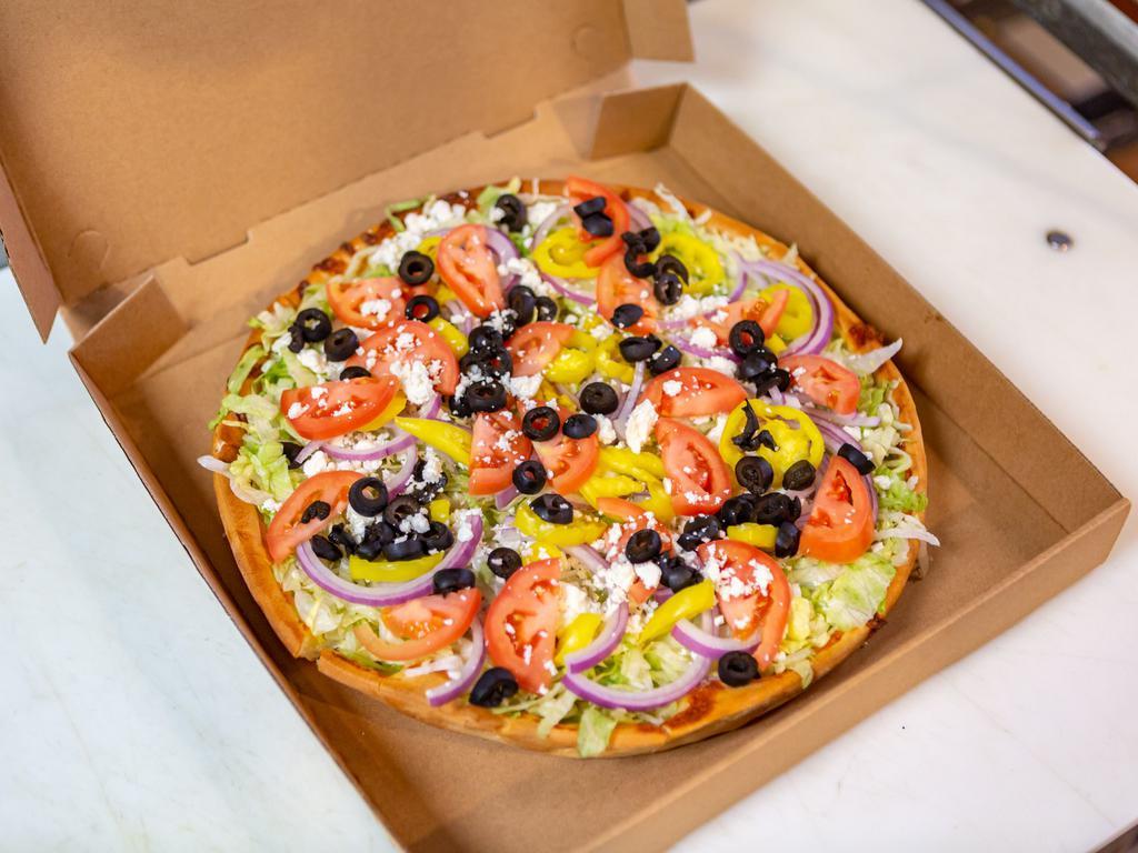 Salad Pizza · Cheesy crust topped with ranch dressing, lettuce, tomato, onion, feta cheese, banana pepper, and black olive.