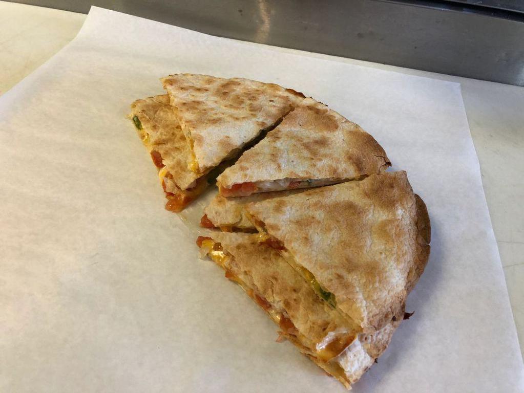Quesadillas · Baked tortilla filled with melted cheddar and mozzarella cheese, onions, tomatoes, and green peppers, served with sour cream and salsa. Add meat for an additional charge.