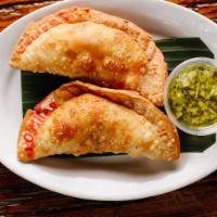 Beef Empanadas by 90 Miles Cuban Cafe · By 90 Miles Cuban Cafe. 2 pieces. Comes with chimichurri sauce. Contains gluten, soy, and ni...
